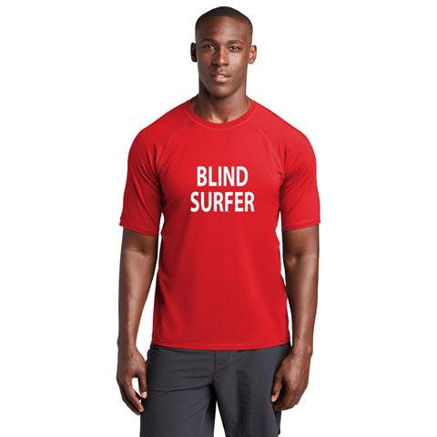 Red short sleeve rash guard, front reads BLIND SURFER