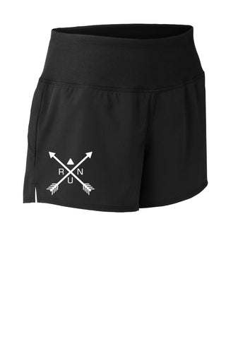 Front of ladies black shorts with reflective crossed arrows RUN design on right leg.